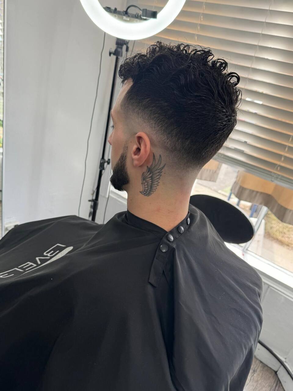 Curly mohawk with skin fade
