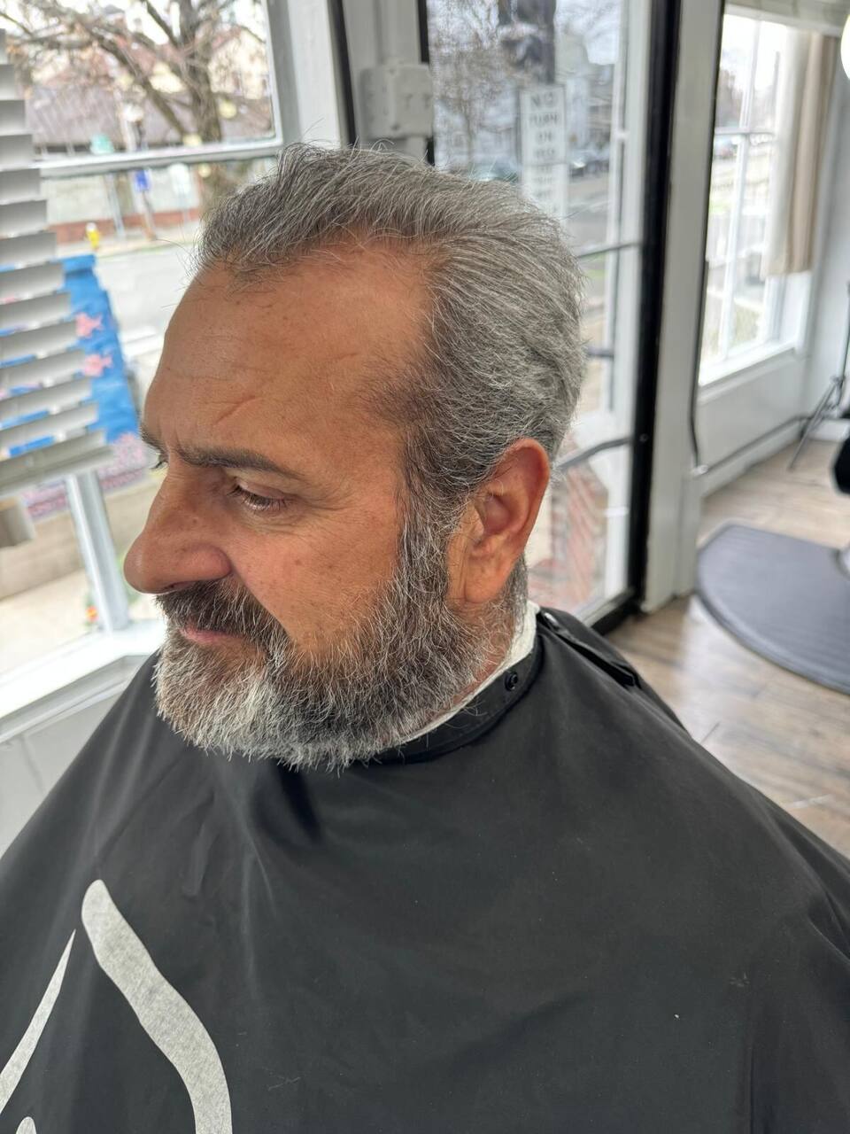 Grey hair with full beard styling