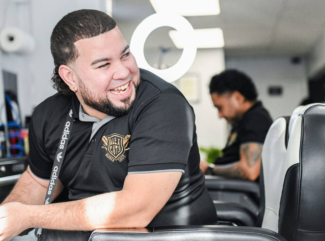 Barber smiling in the shop